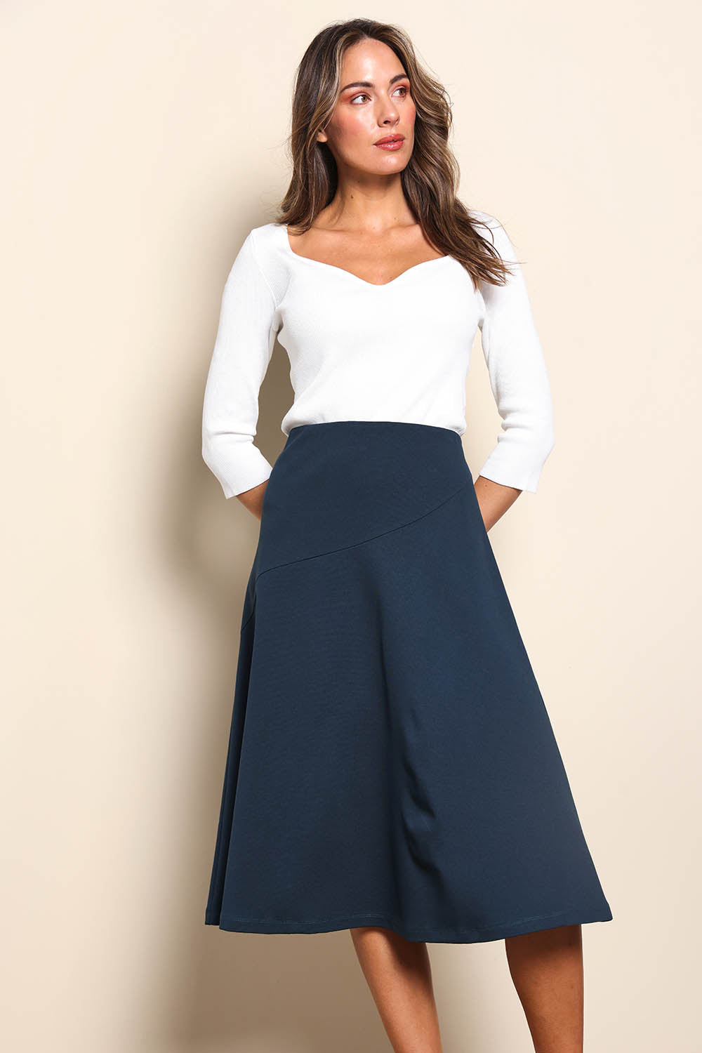 Model Madelinec wearing size 10 of the The Rib Knit Sweetheart Neck Top – Snow in colour Snow, in a cropped view