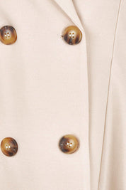 Product shot of the The Desire Longline Ponte Coat – Sand in colour Sand, showing detail