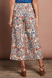 Model Madeline wearing size 10 of The Printed Wide Leg Culotte in colour Mirage, from the back