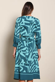 Model Madelinec wearing size 10 of the The Printed Wrap Dress - Abstract in colour Abstract, from the back
