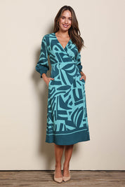 Model Madelinec wearing size 10 of the The Printed Wrap Dress - Abstract in colour Abstract, from the front