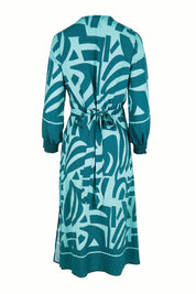 Product shot of the The Printed Wrap Dress - Abstract in colour Abstract, from the back