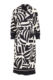 Product shot of the The Printed Wrap Dress - Blackabstract in colour Blackabstract, from the front