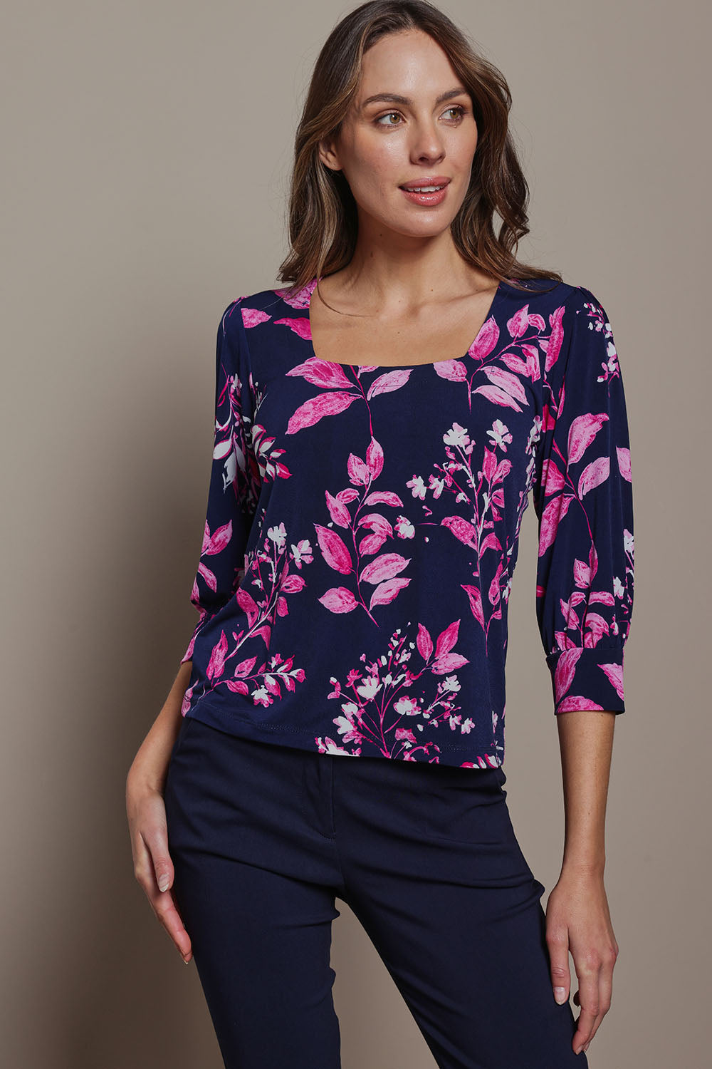 Model Madeline wearing size 10 of The Printed Square Neck Blouse in colour Nightpetal (Blue), from the front, cropped image