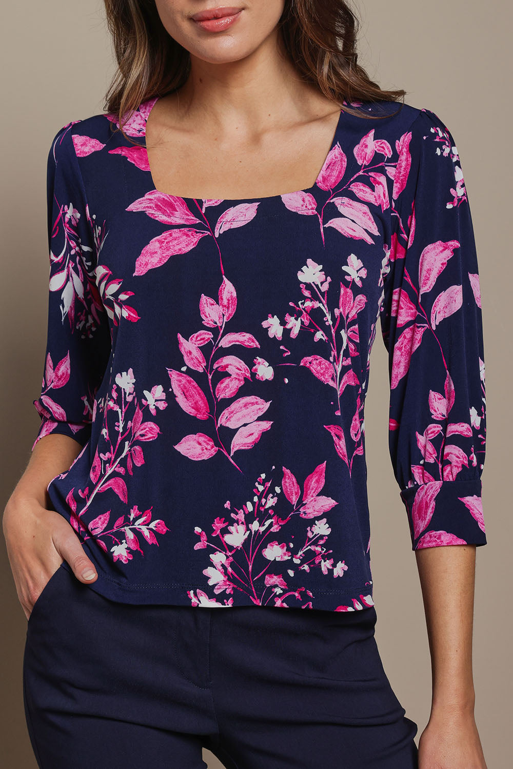 Model Madeline wearing size 10 of The Printed Square Neck Blouse in colour Nightpetal (Blue), from the front, cropped image