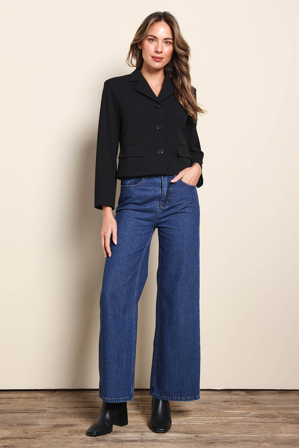 Model Madelinec wearing size 10 of the The Buttoned Blazer With Pocket Details – Black in colour Black, from the front