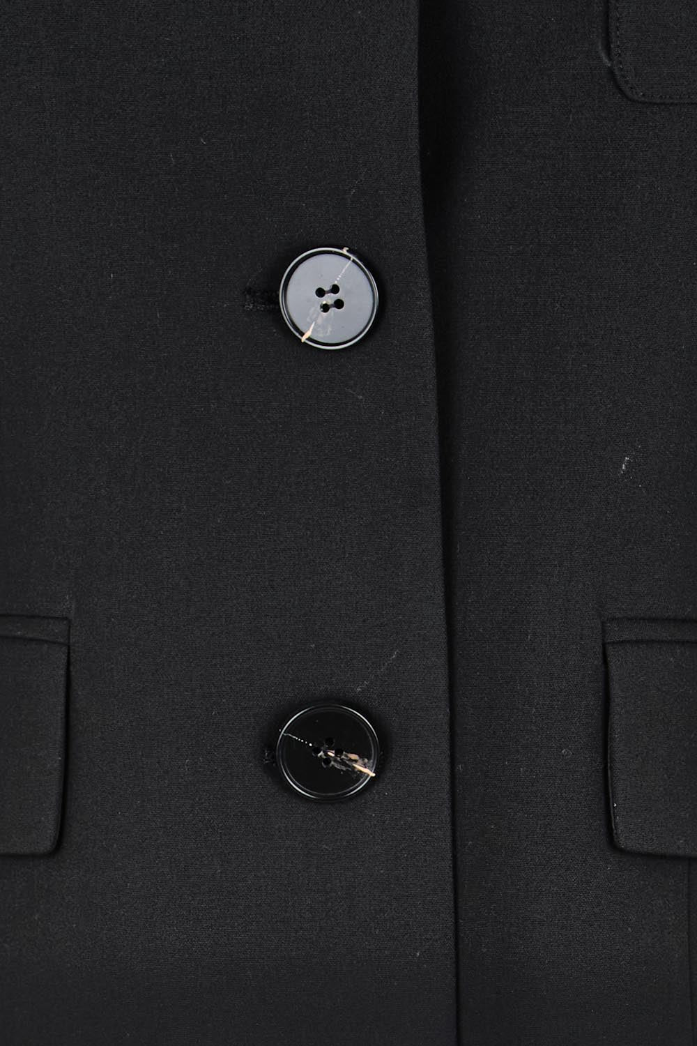 Product shot of the The Buttoned Blazer With Pocket Details – Black in colour Black, showing detail