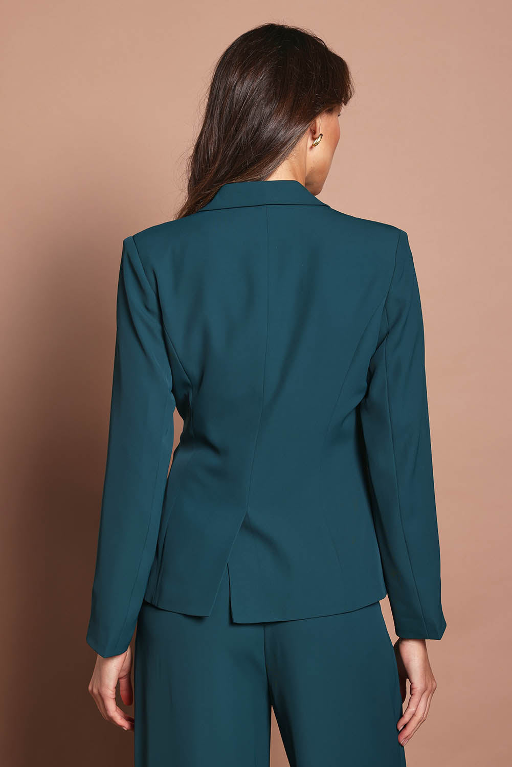 Model Madeline wearing size 10 of The Soft Suiting Lined Blazer in colour Darkteal (Green), from the back
