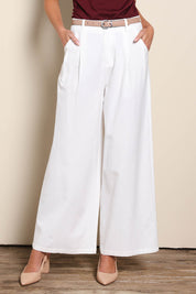 Model Madelinec wearing size 10 of the The Linen Blend Tailored Pant - Snow in colour Snow, in a cropped view