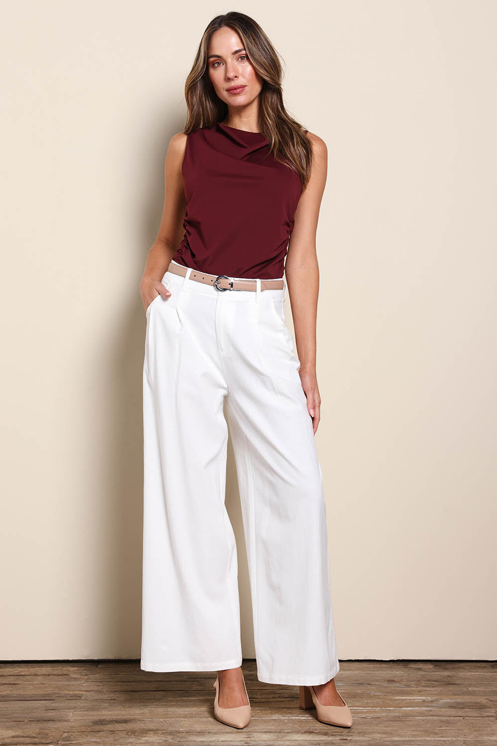 Model Madelinec wearing size 10 of the The Linen Blend Tailored Pant - Snow in colour Snow, from the front