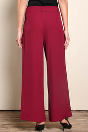 Model Madelinec wearing size 10 of the The Soft Suiting Pant – Burgundy in colour Burgundy, from the back