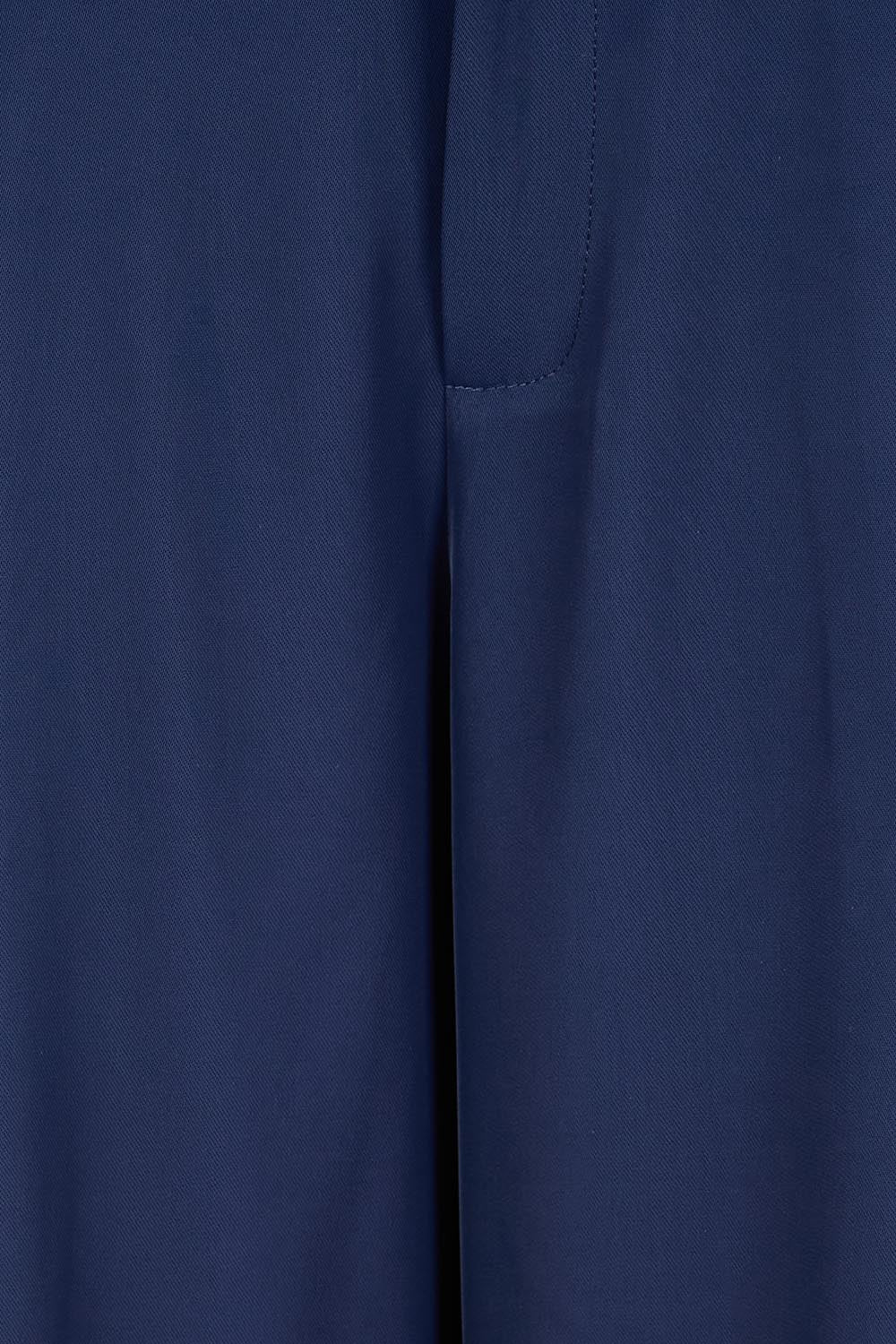 Product shot of the The Soft Suiting Pant – Navy in colour Navy, showing detail