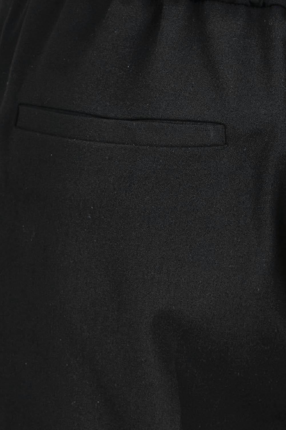 Product shot of the The Tapered Pull On Stretch Pant – Black in colour Black, showing detail
