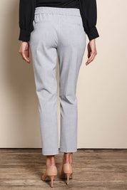 Model Madelinec wearing size 10 of the The Tapered Pull On Stretch Pant – Grey in colour Grey, from the back