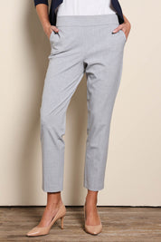 Model Madelinec wearing size 10 of the The Tapered Pull On Stretch Pant – Grey in colour Grey, in a cropped view