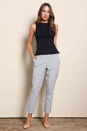 Model Madelinec wearing size 10 of the The Tapered Pull On Stretch Pant – Grey in colour Grey, from the front