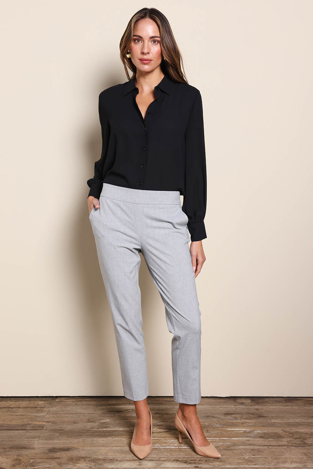 Model Madelinec wearing size 10 of the The Tapered Pull On Stretch Pant – Grey in colour Grey, from the front