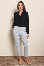 Model Madelinec wearing size 10 of the The Tapered Pull On Stretch Pant – Grey in colour Grey, from the front