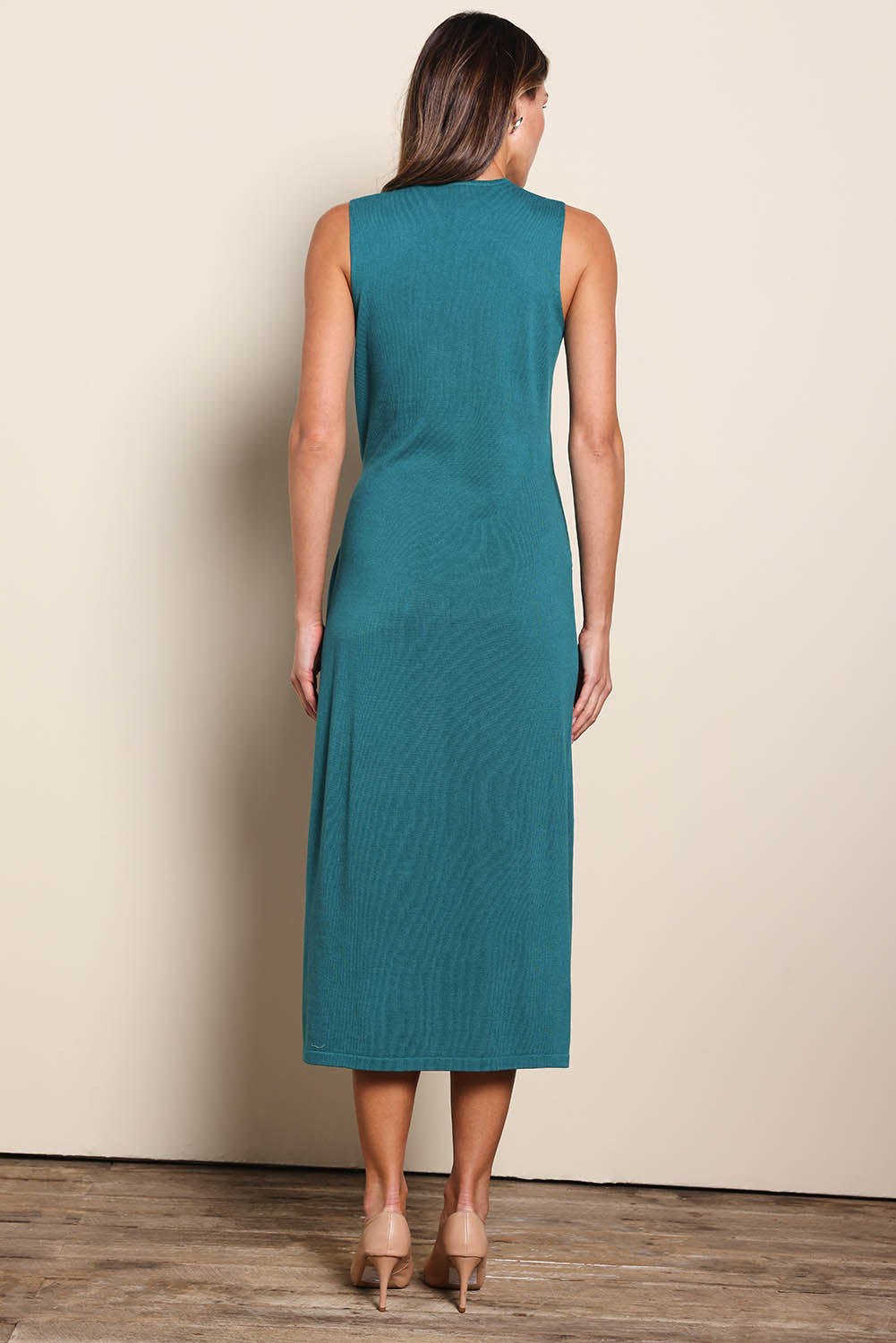 Model Madelinec wearing size 10 of the The All Season Faux Wrap Knit Dress – Jewel in colour Jewel, from the front