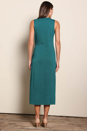 Model Madelinec wearing size 10 of the The All Season Faux Wrap Knit Dress – Jewel in colour Jewel, from the front