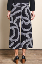 Model Madelinec wearing size 10 of the The Printed Stretch Wide Leg Culotte – Contour in colour Contour, from the back