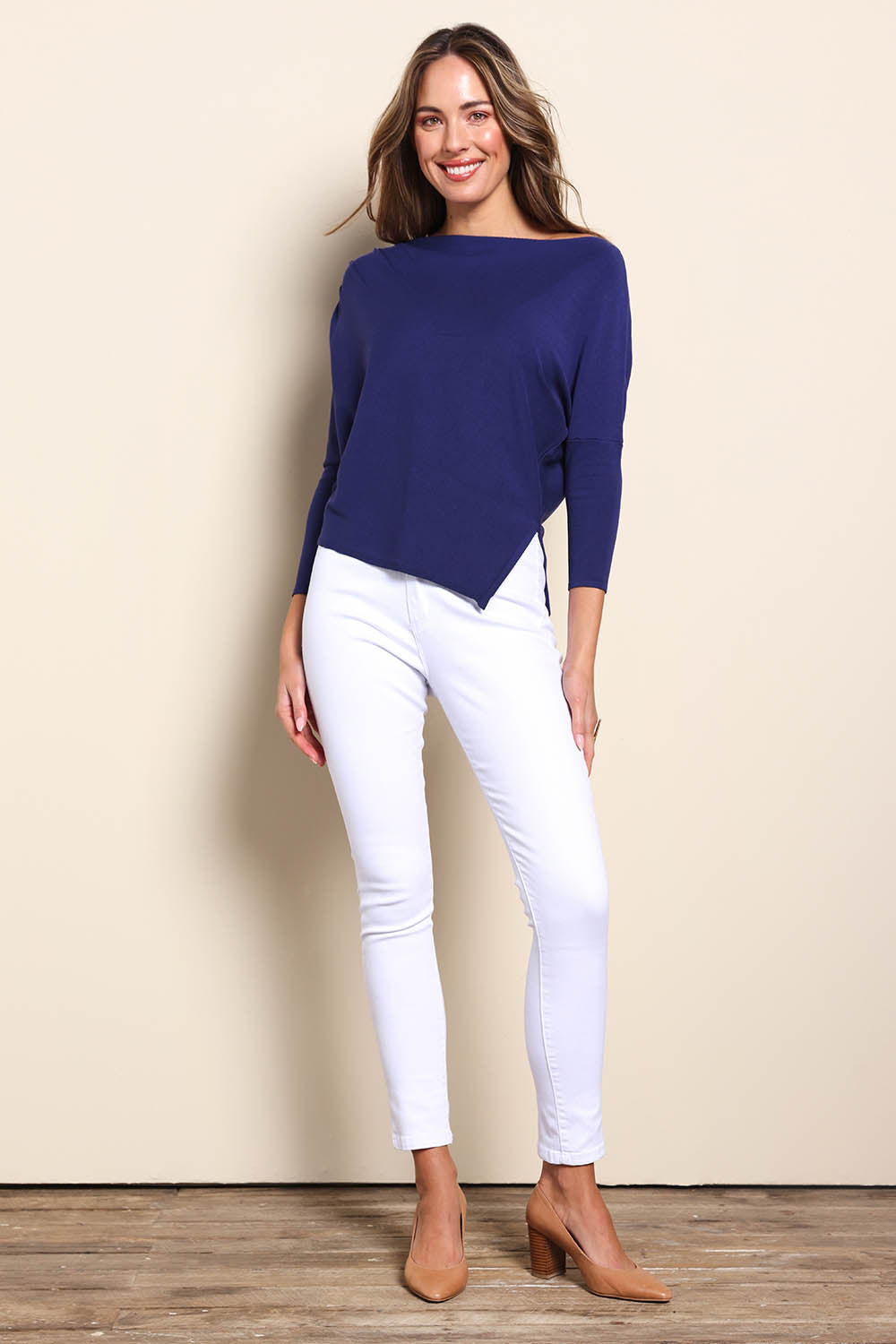 Model Madelinec wearing size 10 of the The Pleated Shoulder Knit – Indigoblue in colour Indigoblue, from the front