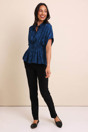 Model Amandam wearing size 10 of the The Jacquard Pleated Shirt - Darkpeacock in colour Darkpeacock, from the front
