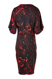 Product shot of The Printed Kimono Sleeve Pencil Dress in colour Redfleur (Black), from the back