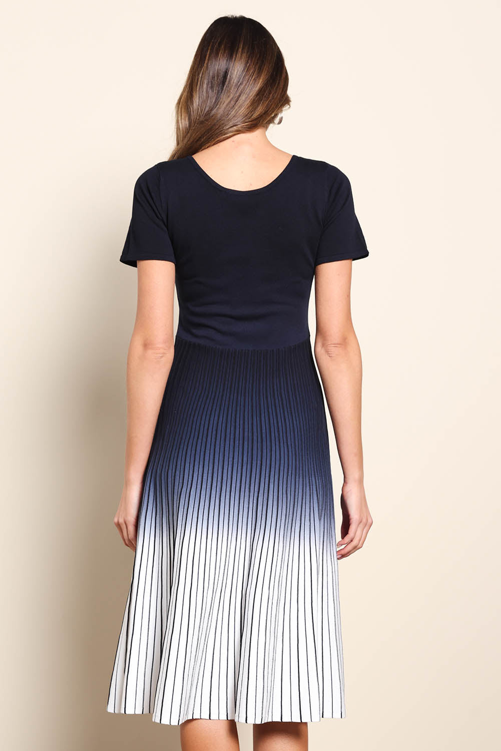 Model Madelinec wearing size 10 of the The Reversible Ombre Knit Dress – Inkivory in colour Inkivory, from the back