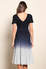 Model Madelinec wearing size 10 of the The Reversible Ombre Knit Dress – Inkivory in colour Inkivory, from the back