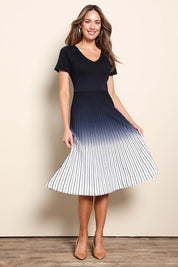 Model Madelinec wearing size 10 of the The Reversible Ombre Knit Dress – Inkivory in colour Inkivory, from the front