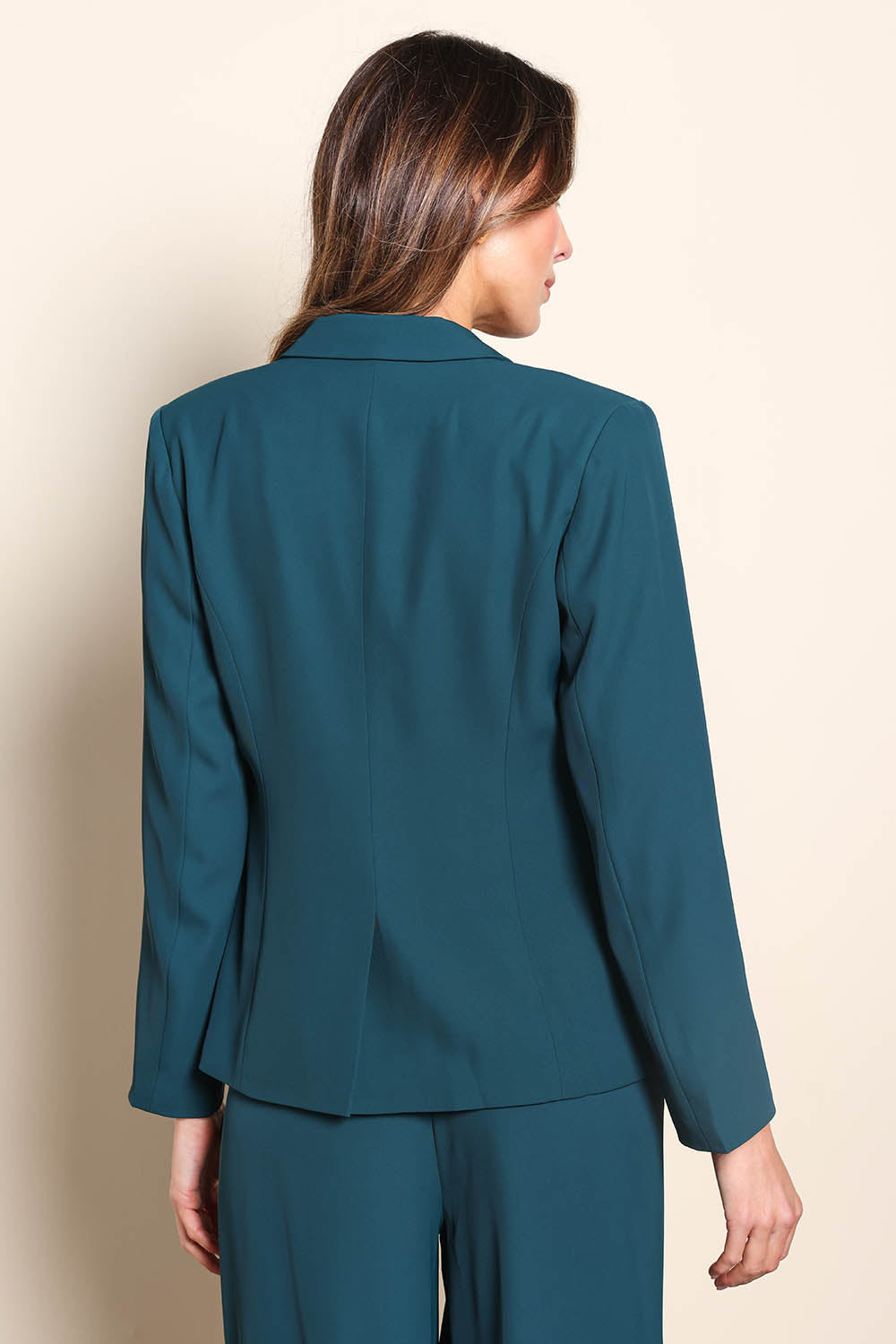 Model Madelinec wearing size 10 of the The Soft Suiting Lined Button Blazer – Darkteal in colour Darkteal, from the back
