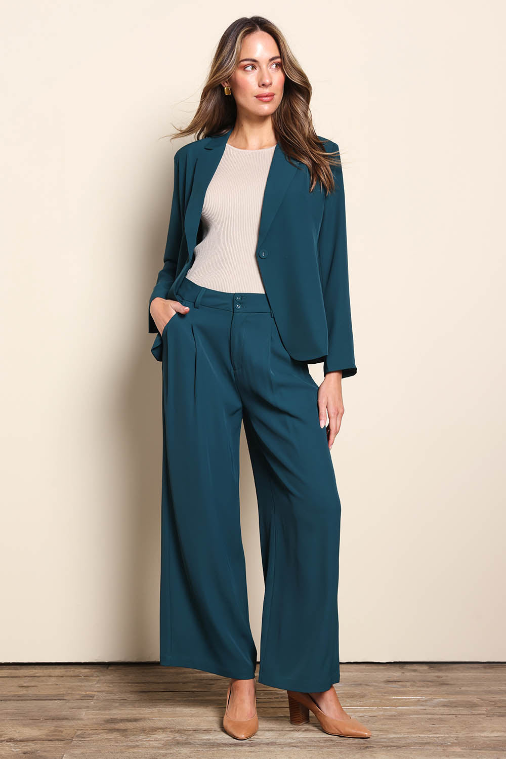 Model Madelinec wearing size 10 of the The Soft Suiting Lined Button Blazer – Darkteal in colour Darkteal, from the front