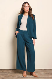 Model Madelinec wearing size 10 of the The Soft Suiting Lined Button Blazer – Darkteal in colour Darkteal, from the front