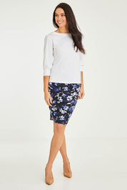 Model Stacey wearing size 10 of The Tube Skirt in colour Fleur (Blue), from the front, showing the whole outfit