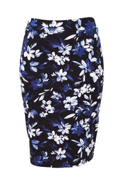 Product shot of The Tube Skirt in colour Fleur (Blue), from the front