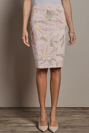 Model Amanda wearing size 10 of The Tube Skirt in colour Blushbloom (Pink), from the front, cropped image