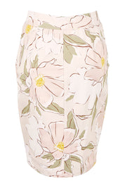 Product shot of The Tube Skirt in colour Blushbloom (Pink), from the back