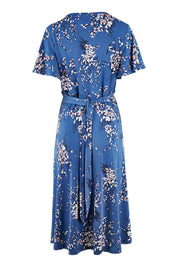 Product shot of The Printed Jersey Faux Wrap Dress in colour Blossom (Blue), from the back