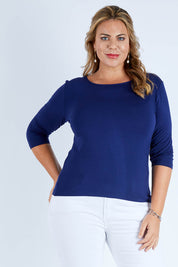 Model Fiona wearing size 16 of The Reversible Cowl Neck Top in colour Navy (Blue), from the front, cropped image