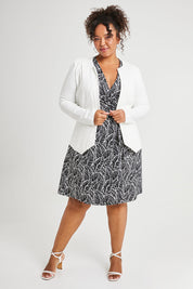 Model Alexis wearing size 16 of The Adore Jacket in colour Ivory (White), from the front, showing the whole outfit
