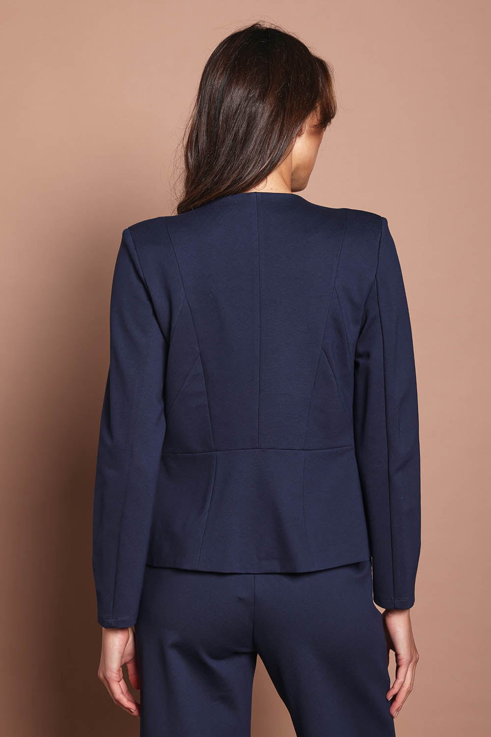 Model Madeline wearing size 10 of The Ponte Adore Jacket in colour Darknavy (Blue), from the back
