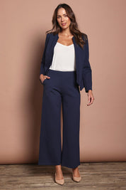 Model Madeline wearing size 10 of The Ponte Adore Jacket in colour Darknavy (Blue), from the front, showing the whole outfit