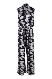 Product shot of the Belle Printed Jumpsuit in colour Strokes (Blue), from the front