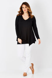 Model Laura wearing size 12 of the Belle V Neck Forgiver Tunic in colour Black (Black), from the front, showing the whole outfit