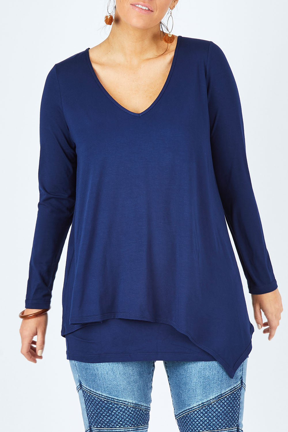 Model Laura wearing size 12 of the Belle V Neck Forgiver Tunic in colour Navy (Blue), from the front, cropped image
