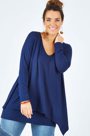 Model Laura wearing size 12 of the Belle V Neck Forgiver Tunic in colour Navy (Blue), from the front, cropped image