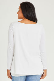 Model Terri-Leigh wearing size 14 of the Belle V Neck Forgiver Tunic in colour White (White), from the back