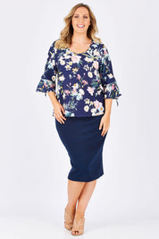 Model Jess wearing size 14 of the Belle Textured Pencil Skirt in colour Navy (Blue), from the front, showing the whole outfit