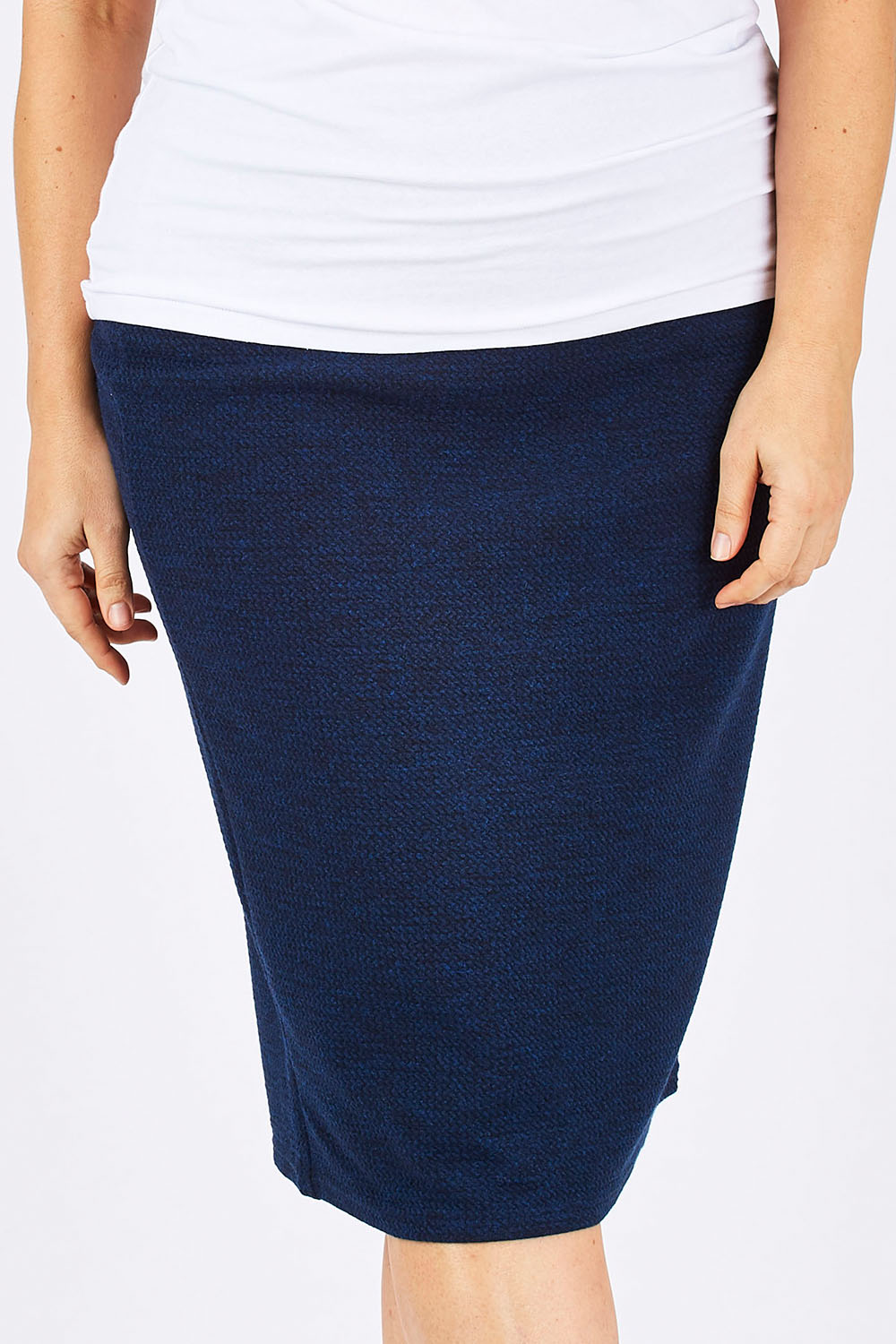 Model Ljubenka wearing size 18 of the Belle Textured Pencil Skirt in colour Navy (Blue), from the front, cropped image